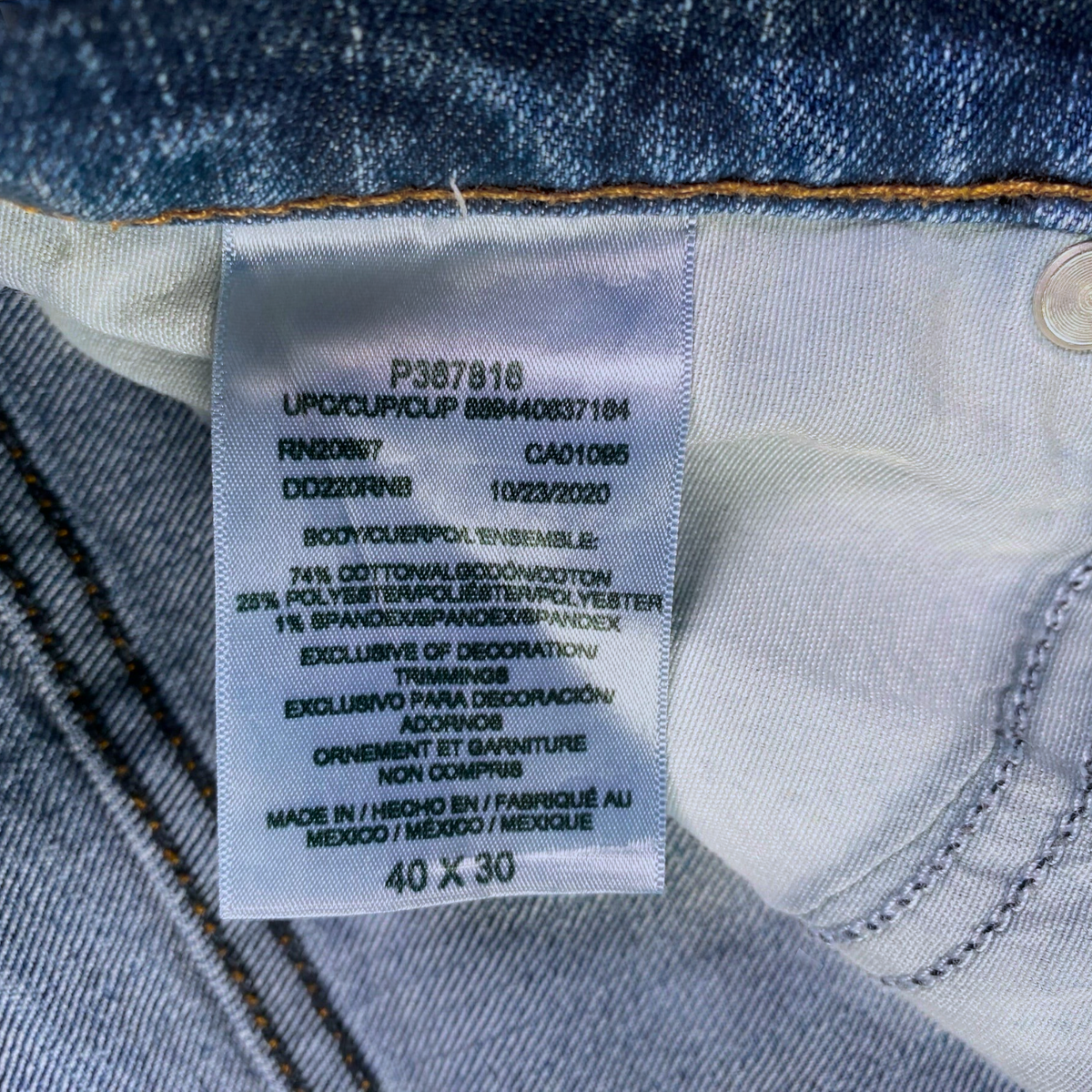 Digg It Thrift & Vintage Dickies Flex jeans interior care label showing fabric composition and size 40x30
