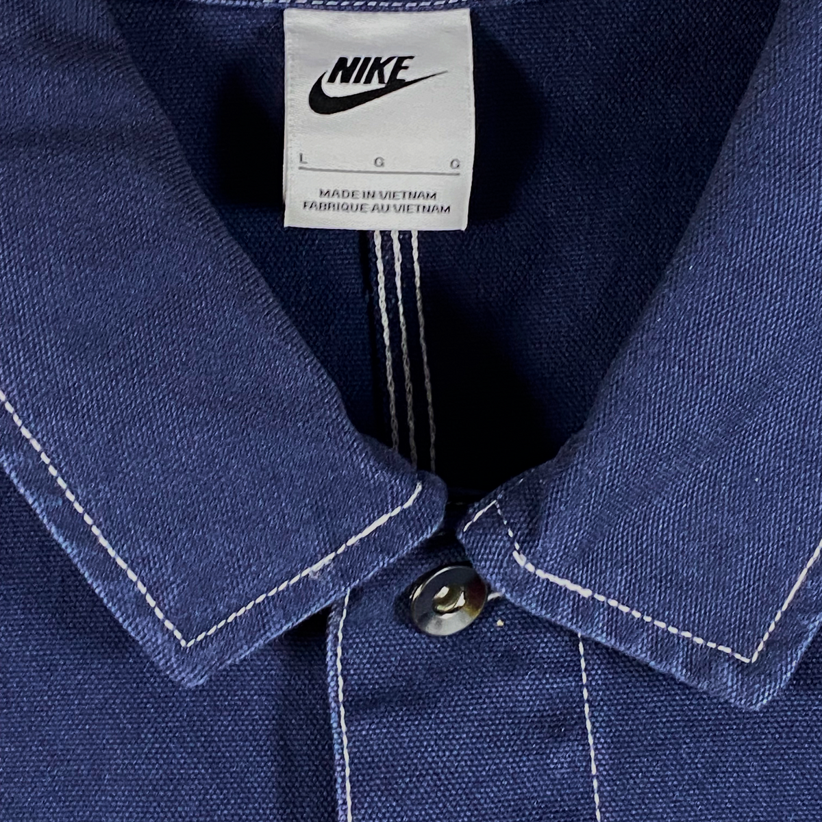 Digg It Thrift & Vintage Nike Life navy canvas chore jacket with white contrast stitching and size large label