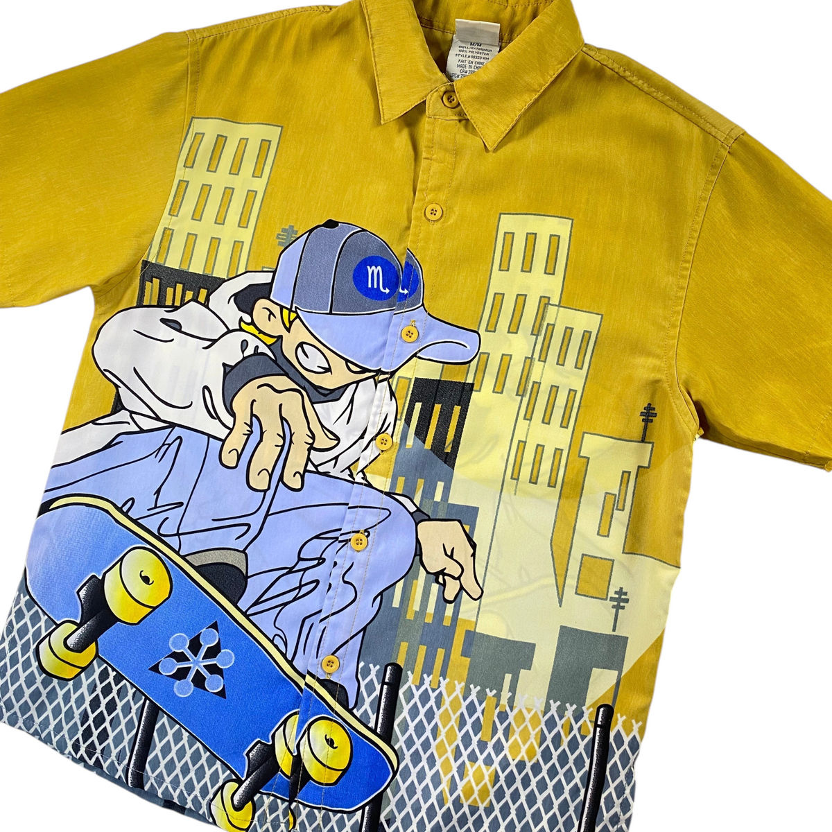 Digg It Thrift & Vintage yellow short sleeve button-up shirt featuring an anime skater graphic and city background.