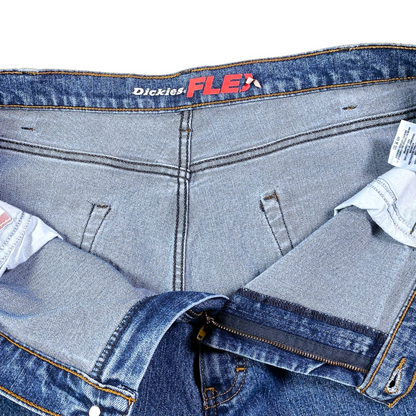 Digg It Thrift & Vintage Dickies Flex blue denim jeans interior showing waistband branding and size tag