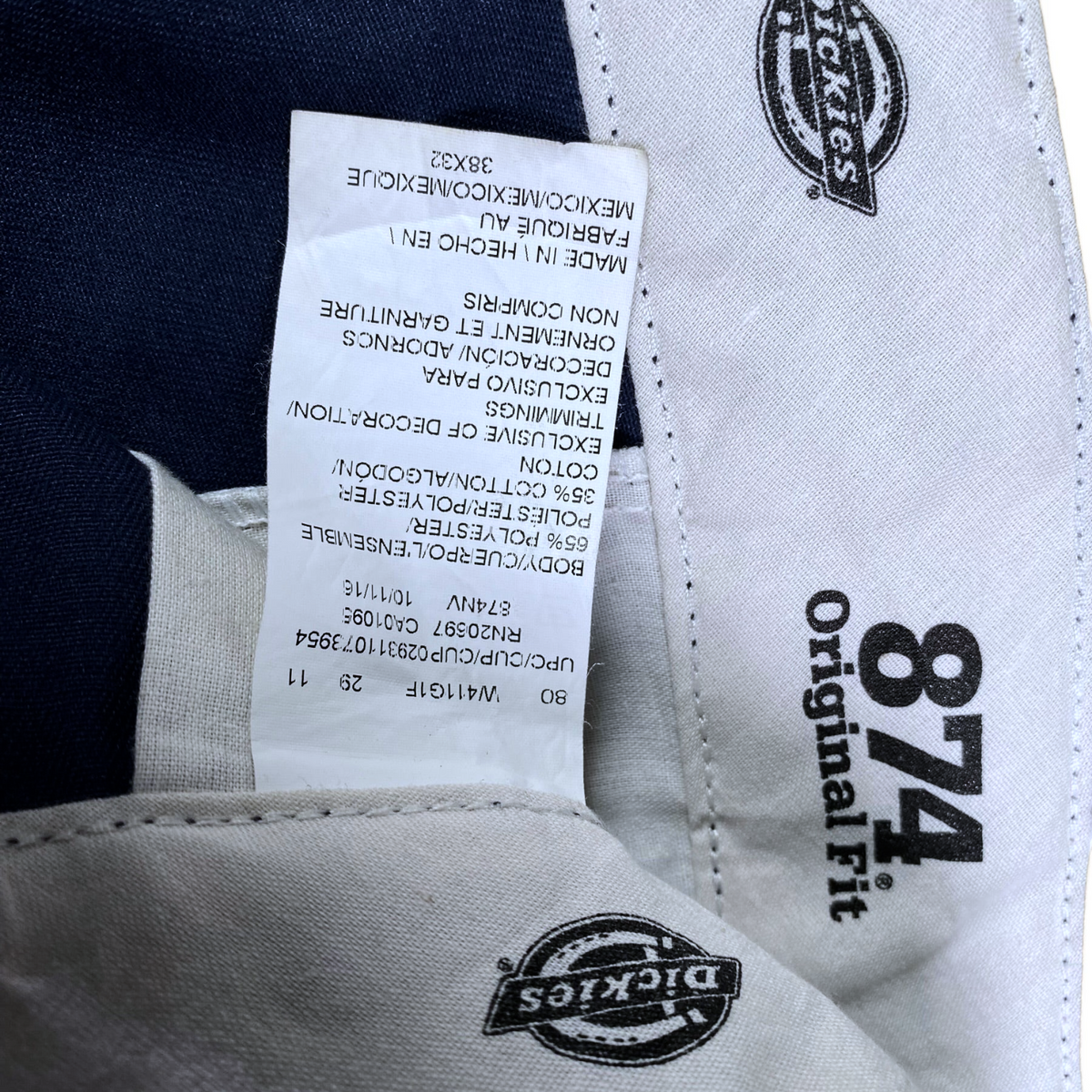 Digg It Thrift & Vintage Dickies 874 Original Fit navy blue pants interior care label showing size 38x32