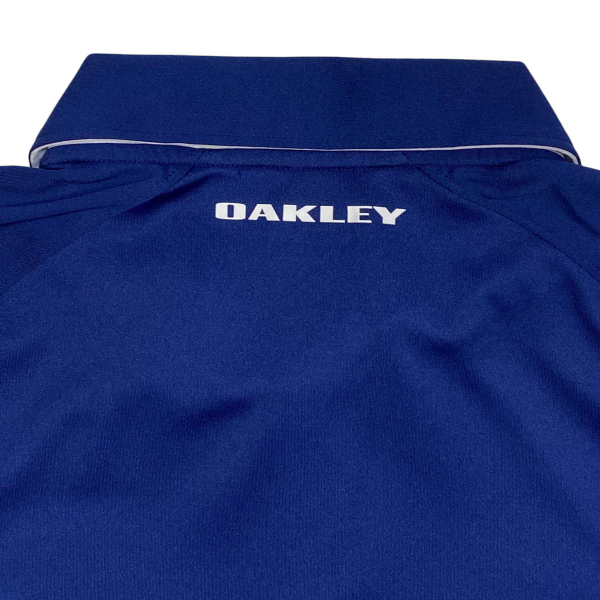Digg It Thrift & Vintage Oakley Ohydrolix navy blue golf polo with white collar trim and back logo detail