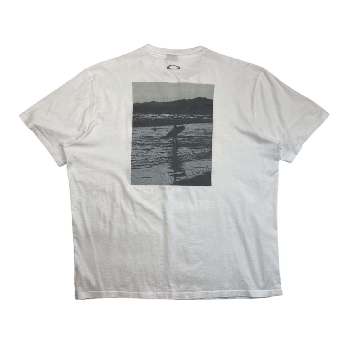 Digg It Thrift & Vintage white Oakley t-shirt featuring a back graphic of a surfer at sunset and a small logo