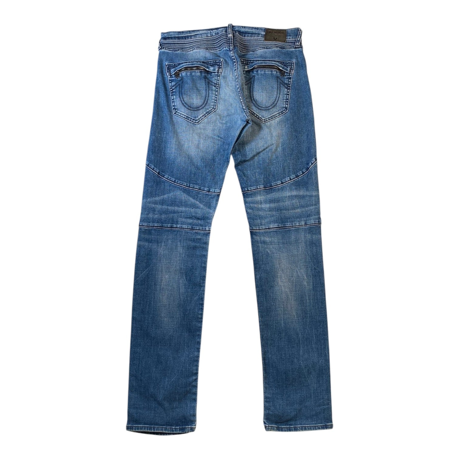 A pair of blue denim jeans shown from the back, featuring classic five-pocket styling and a faded wash, isolated on a white background.