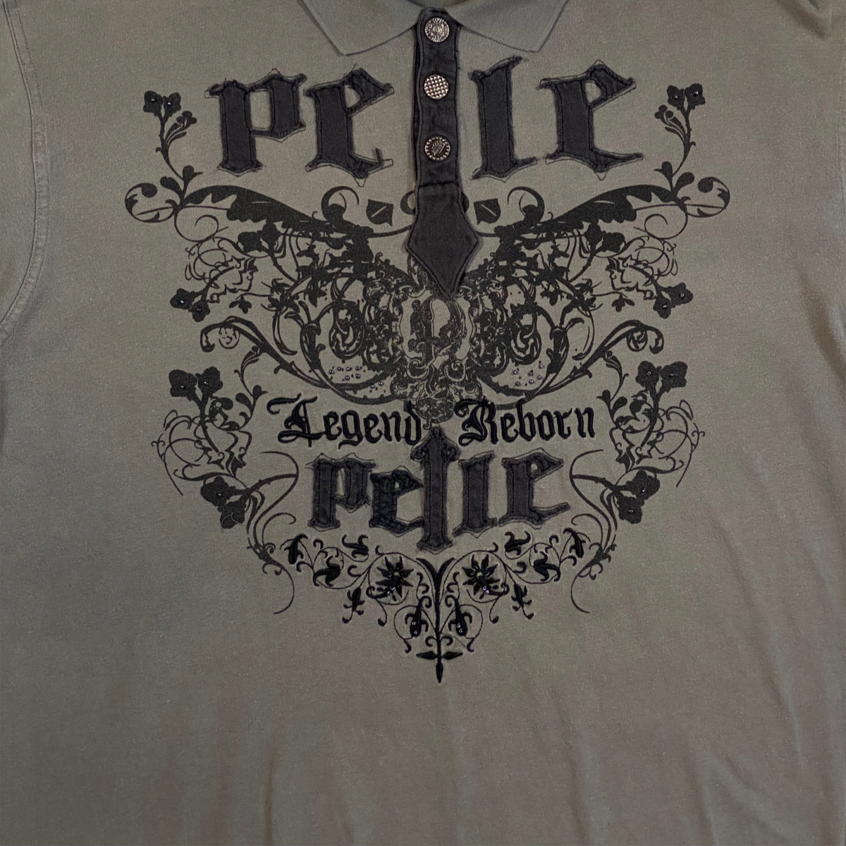 Digg It Thrift & Vintage grey Pelle Pelle Legend Reborn gothic graphic polo shirt with black embroidery and buttons