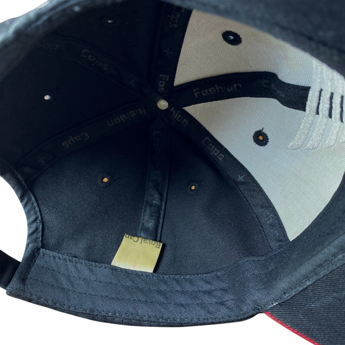 Interior view of a Digg It Thrift & Vintage Honda Wing racing baseball cap featuring black and white panels.