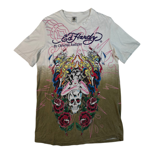 Ed Hardy graphic t-shirt featuring a white-to-brown gradient design with a colorful tattoo-style illustration of a skull, roses, and a woman's face, with the Ed Hardy brand logo printed above.