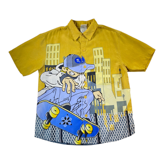 Digg It Thrift & Vintage yellow short sleeve button-up shirt featuring a vibrant anime skater graphic print
