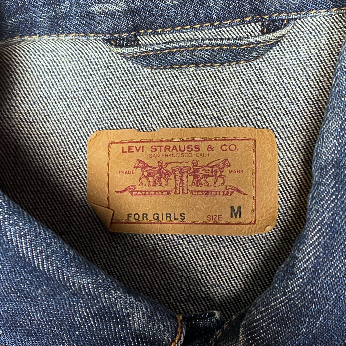 Digg It Thrift & Vintage Levi's For Girls denim jacket interior neck label showing size medium