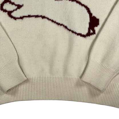 Digg It Thrift & Vintage cream knit sweater featuring a dark red intarsia jumping rabbit design with ribbed cuffs.