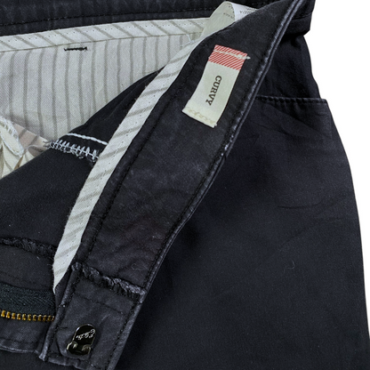 Digg It Thrift & Vintage dark grey Dickies women's pants featuring a curvy fit label and striped interior lining.