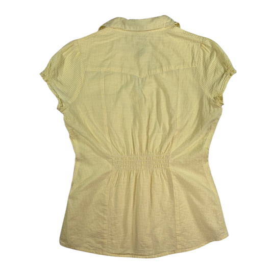 Back view of a Digg It Thrift & Vintage yellow gingham western shirt with short sleeves and a cinched back detail.