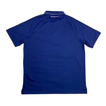 Back view of a Digg It Thrift & Vintage navy blue Oakley Ohydrolix athletic golf polo with white collar detail