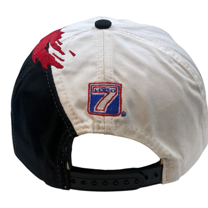 Digg It Thrift & Vintage 90s Chicago Bulls wool snapback cap with black and white panels and red splash detail