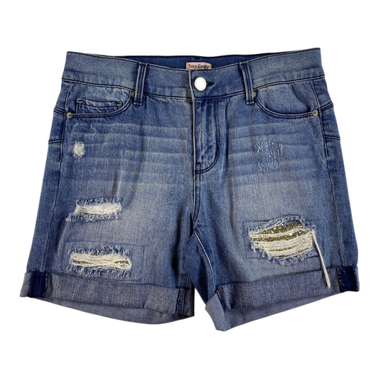 Digg It Thrift & Vintage Juicy Couture denim shorts in medium blue with distressed details and sequined patches.