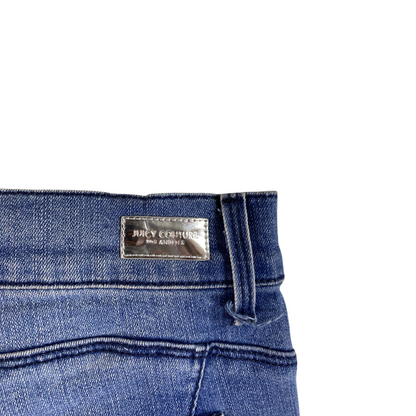 Digg It Thrift & Vintage Juicy Couture Los Angeles denim shorts with a metallic silver logo patch on the waistband