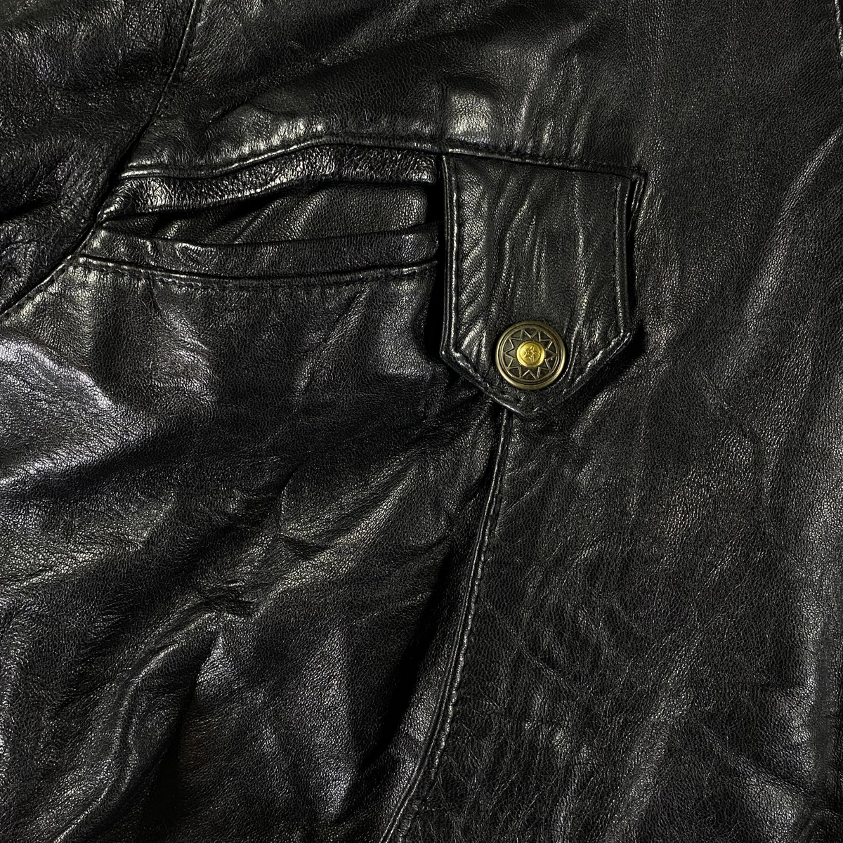Digg It Thrift & Vintage Rojano Barcelona oversized black leather bomber jacket with decorative gold button pocket