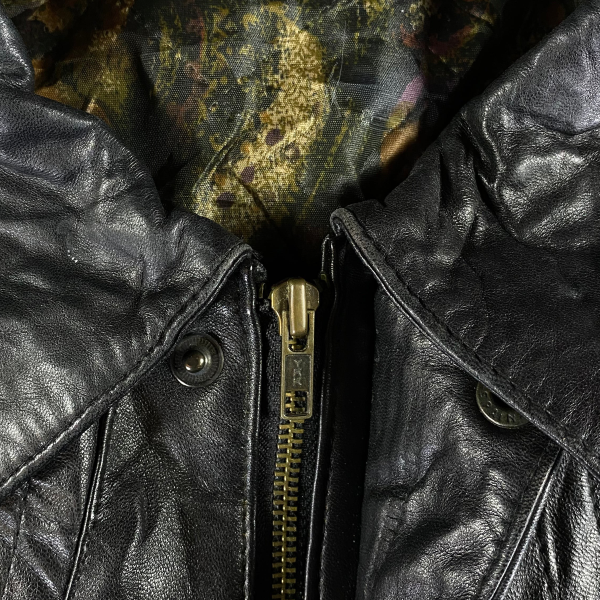 Digg It Thrift & Vintage oversized black Spanish leather bomber jacket with brass zipper and patterned lining