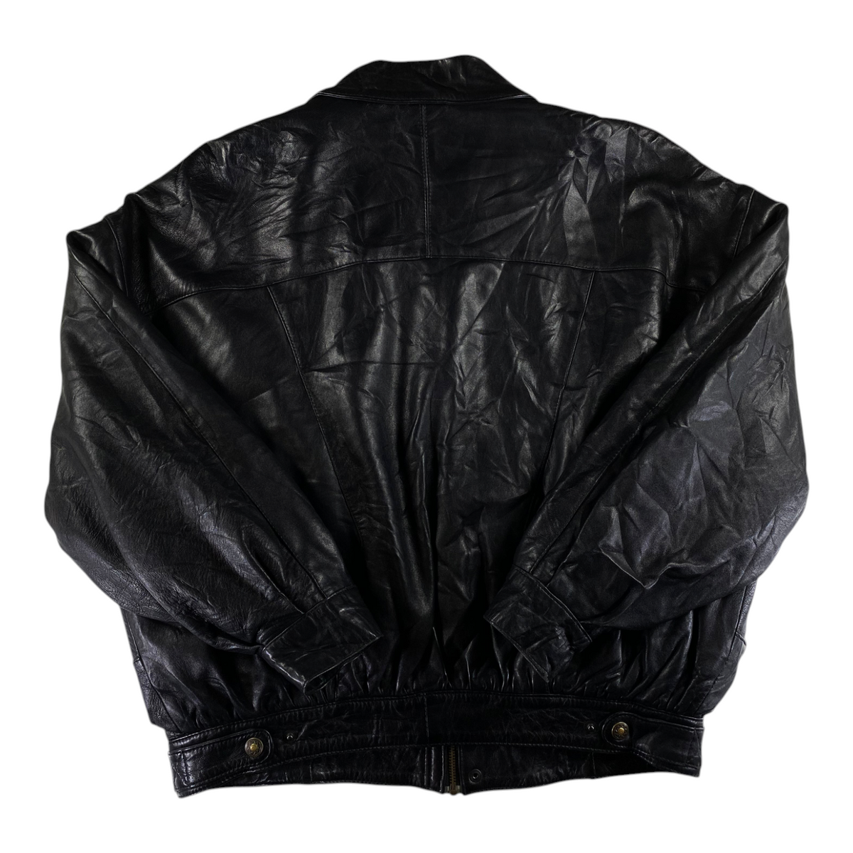 Back view of a black oversized Spanish leather bomber jacket from Digg It Thrift & Vintage, size 3XL