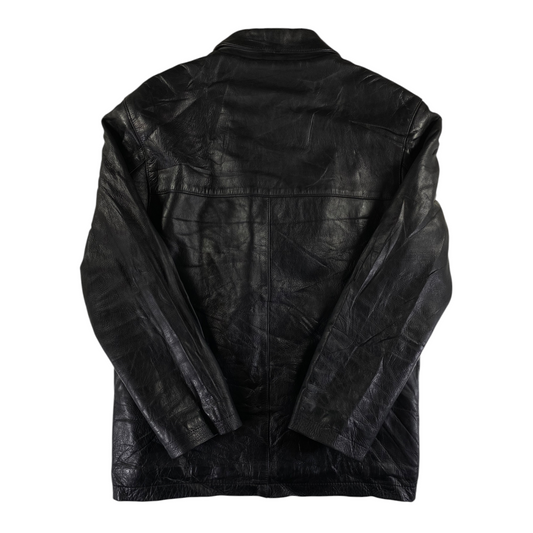 Back view of a black leather buttoned jacket from Digg It Thrift & Vintage with a textured finish