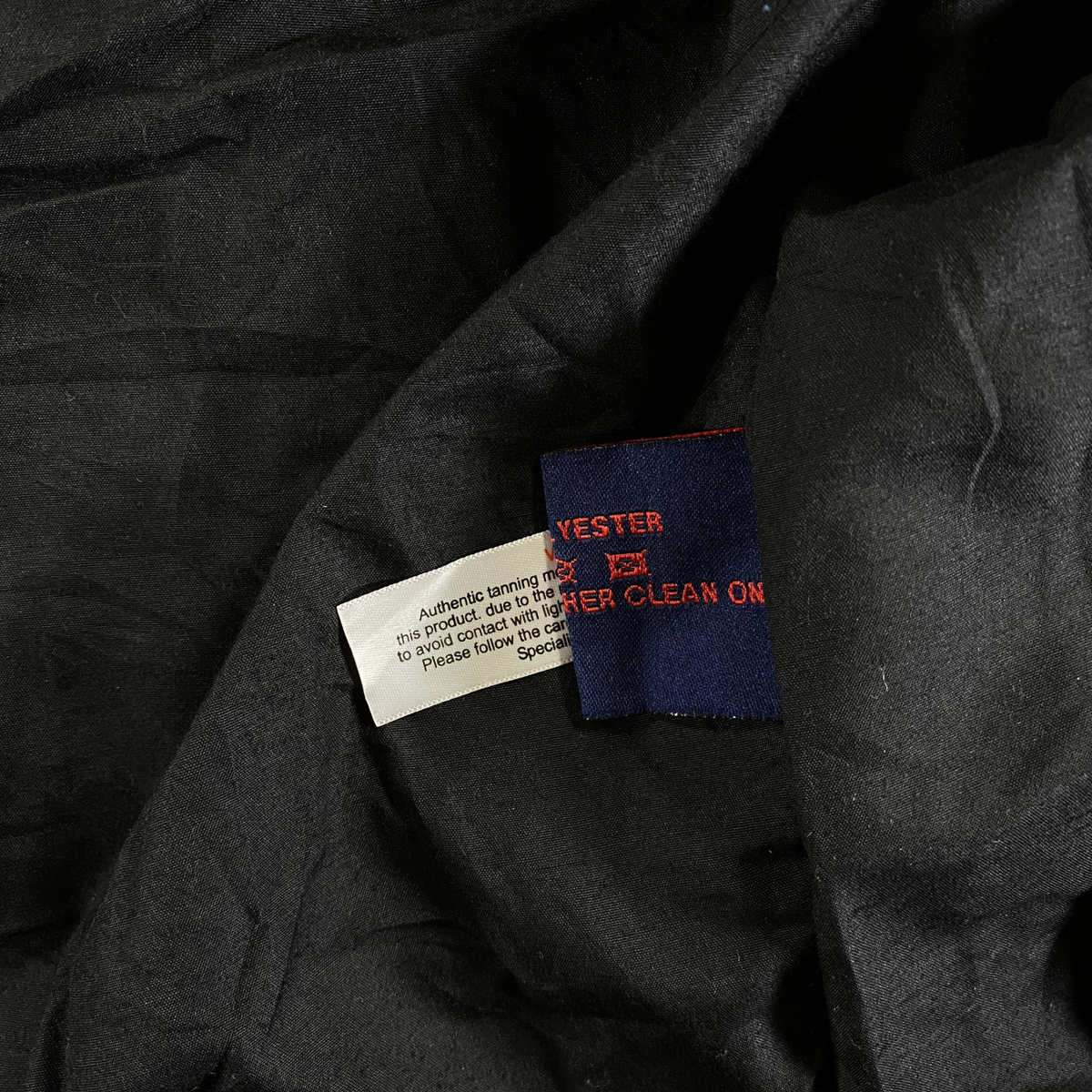 Digg It Thrift & Vintage Lonsdale London leather jacket interior care label and black lining