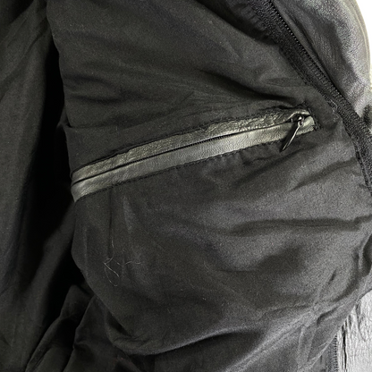 Digg It Thrift & Vintage Lonsdale London leather moto jacket interior showing a black zippered pocket lining