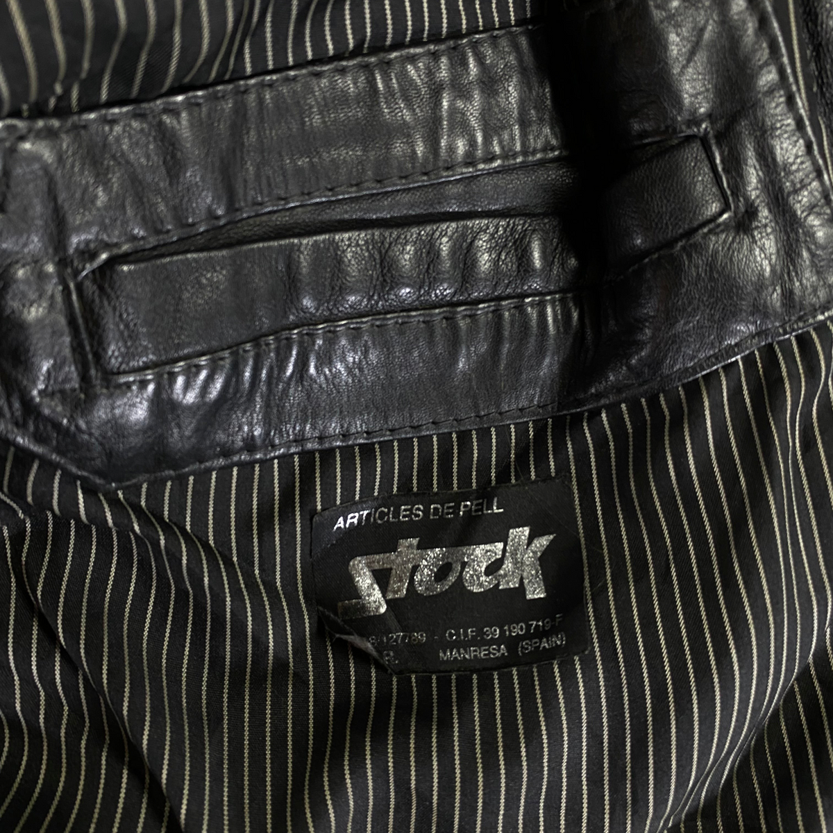 Digg It Thrift & Vintage black leather field parka jacket interior label with striped lining