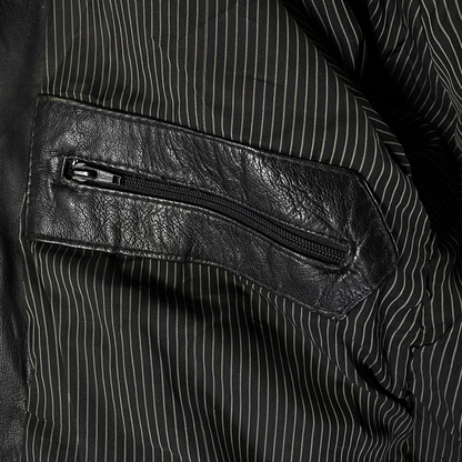 Digg It Thrift & Vintage black leather field parka interior featuring a zippered pocket and pinstripe lining