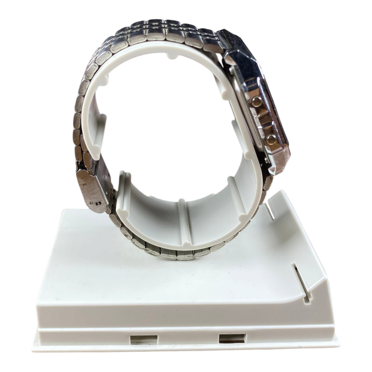 Digg It Thrift & Vintage custom Casio AL-180 solar watch with a silver metal band and negative display side view
