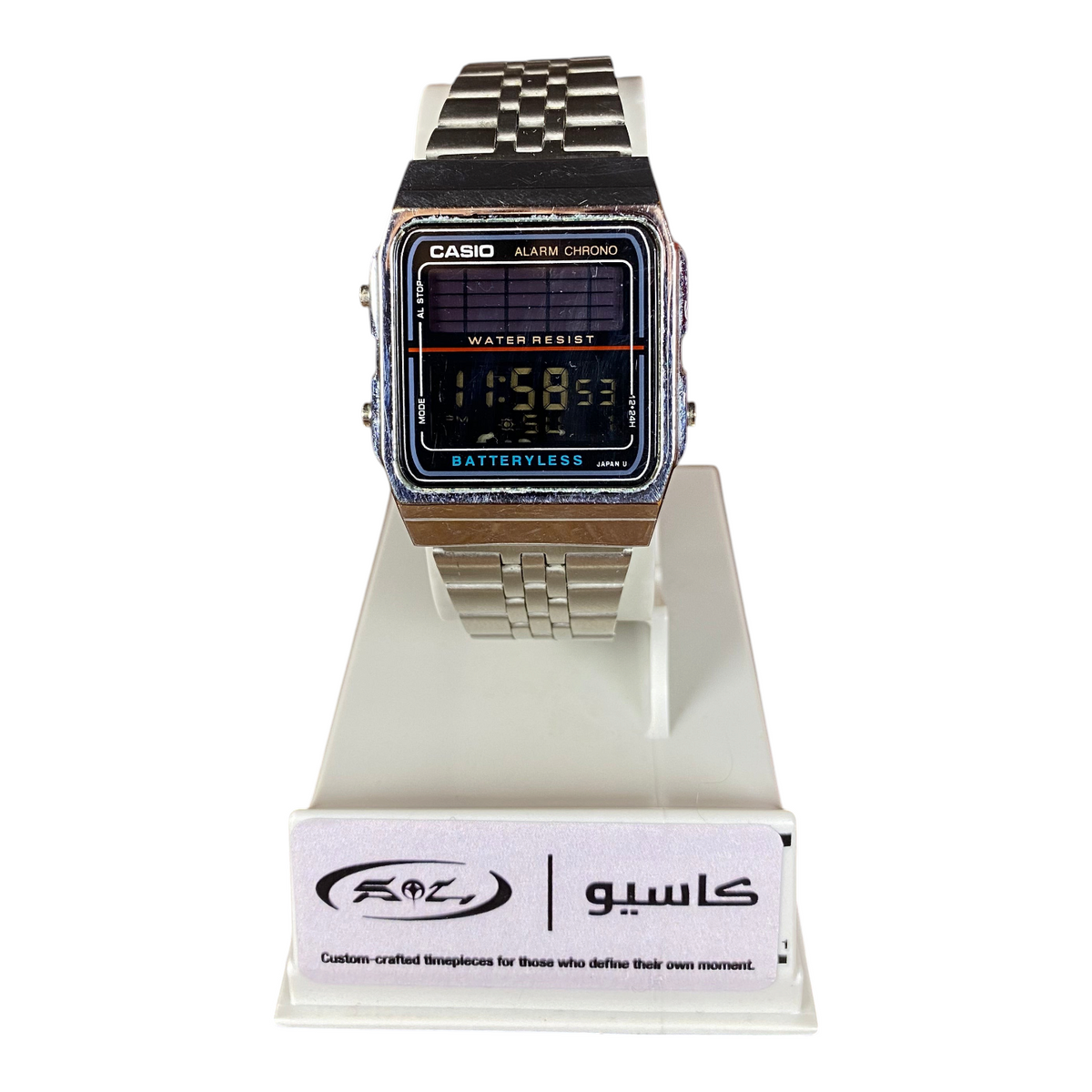 Digg It Thrift & Vintage custom Casio AL-180 solar watch with a silver metal band and stealth negative display.