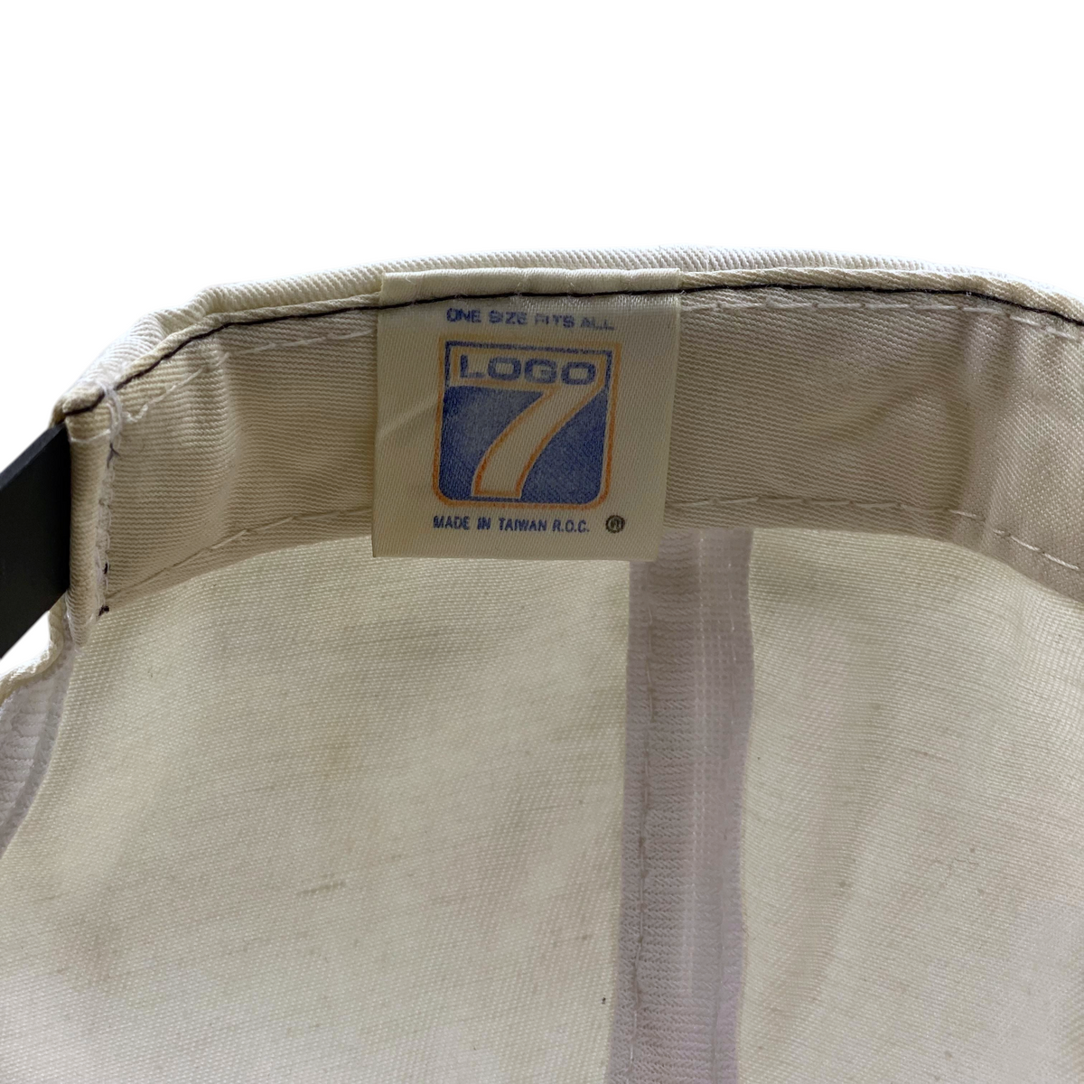 Digg It Thrift & Vintage cap interior label showing Logo 7 branding and Made in Taiwan tag