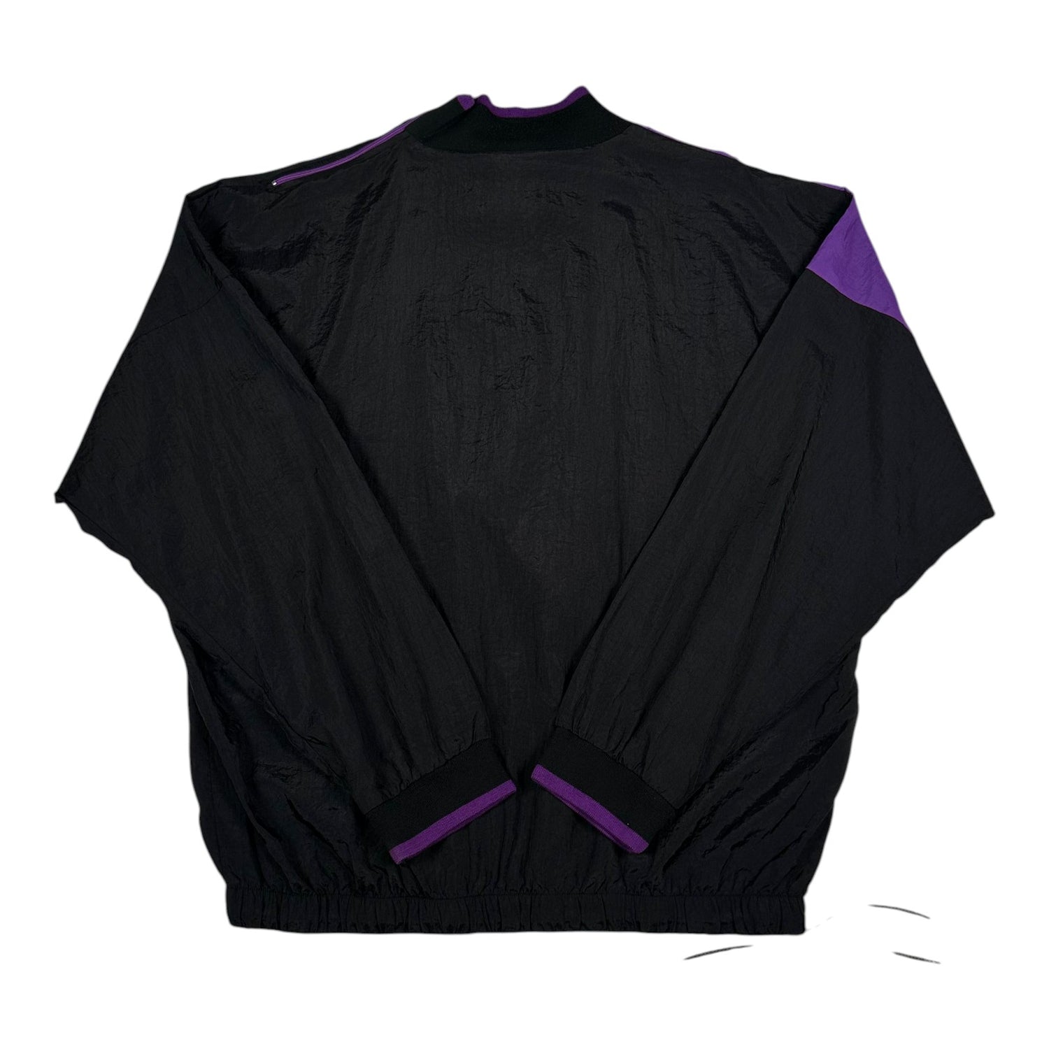 Back view of a vintage Digg It Thrift & Vintage Adidas purple and black colorblock windbreaker pullover jacket