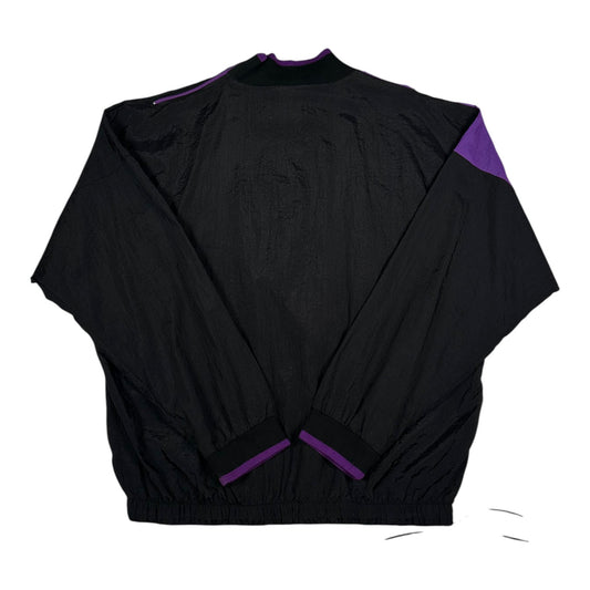 Back view of a vintage Digg It Thrift & Vintage Adidas purple and black colorblock windbreaker pullover jacket
