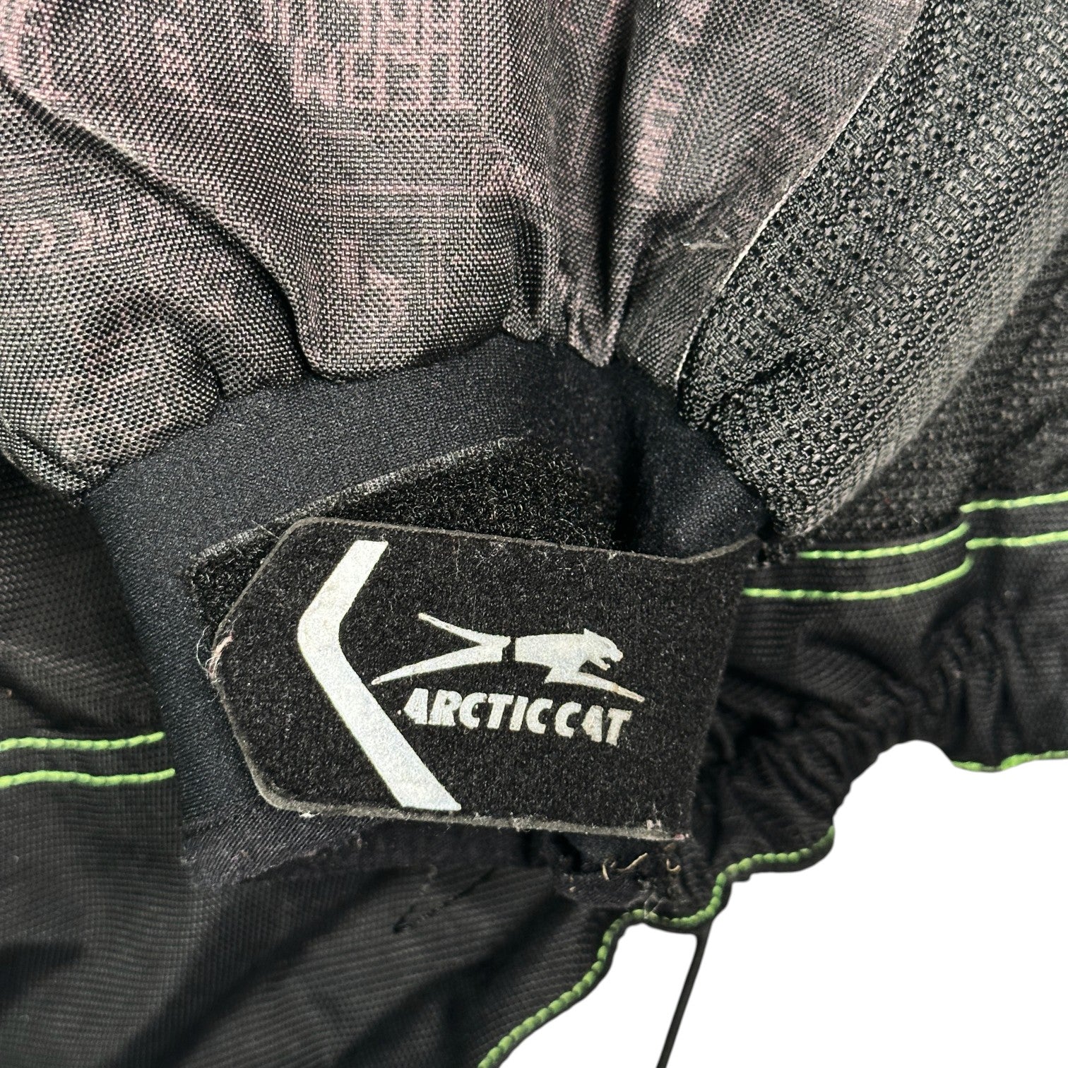 Digg It Thrift & Vintage Arctic Cat Team Arctic snowmobile jacket sleeve cuff with logo patch and green stitching