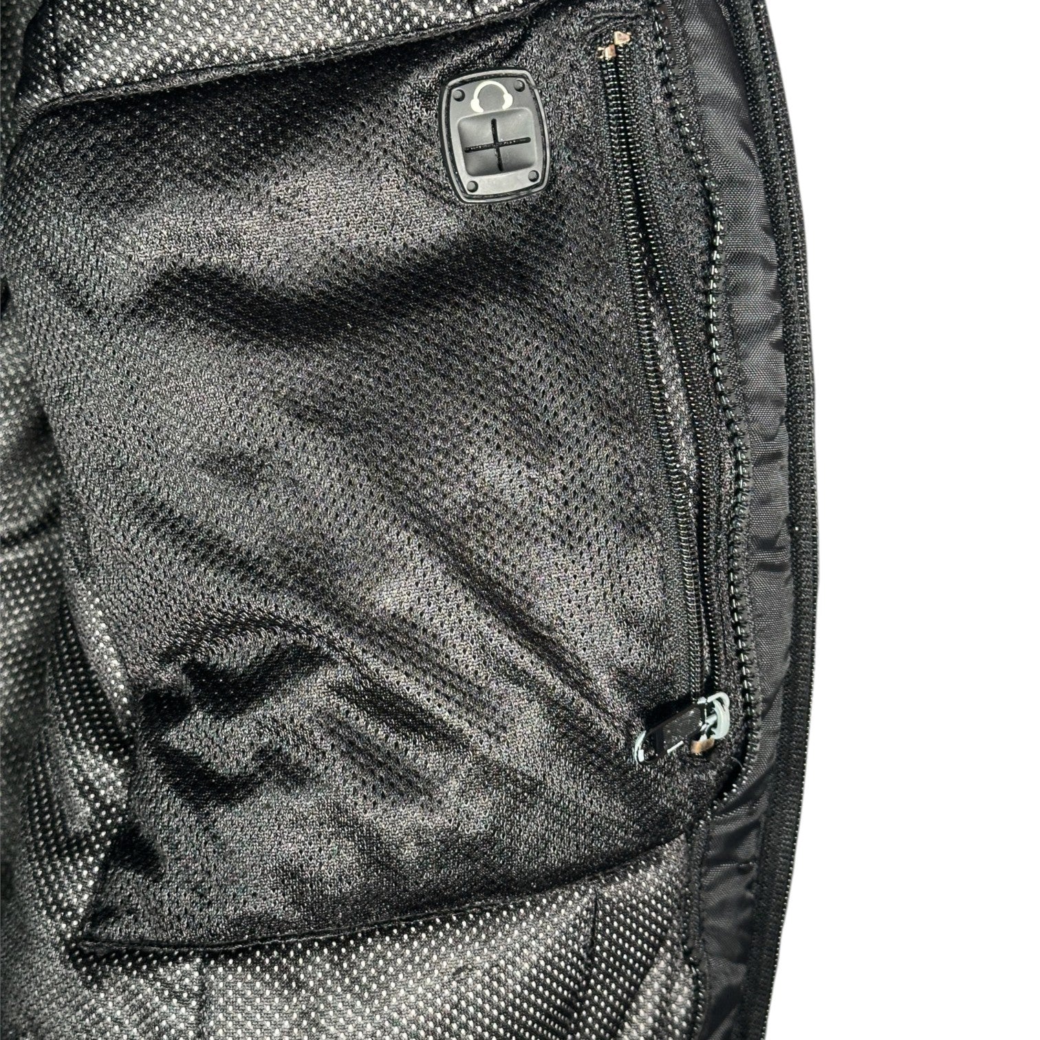 Digg It Thrift & Vintage Arctic Cat snowmobile jacket interior black mesh pocket with zipper and headphone port