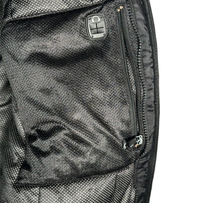 Digg It Thrift & Vintage Arctic Cat snowmobile jacket interior black mesh pocket with zipper and headphone port