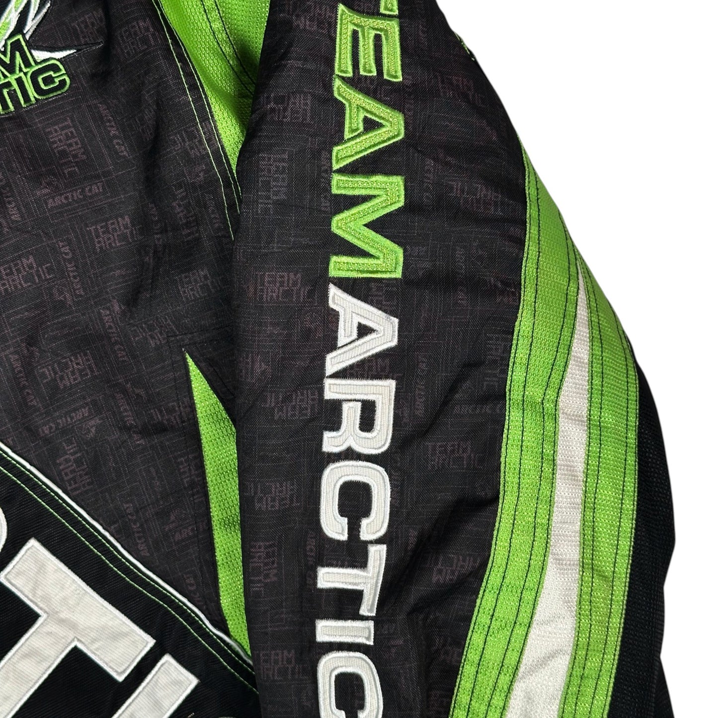 Digg It Thrift & Vintage Arctic Cat Team Arctic snowmobile racing jacket sleeve with green and black branding