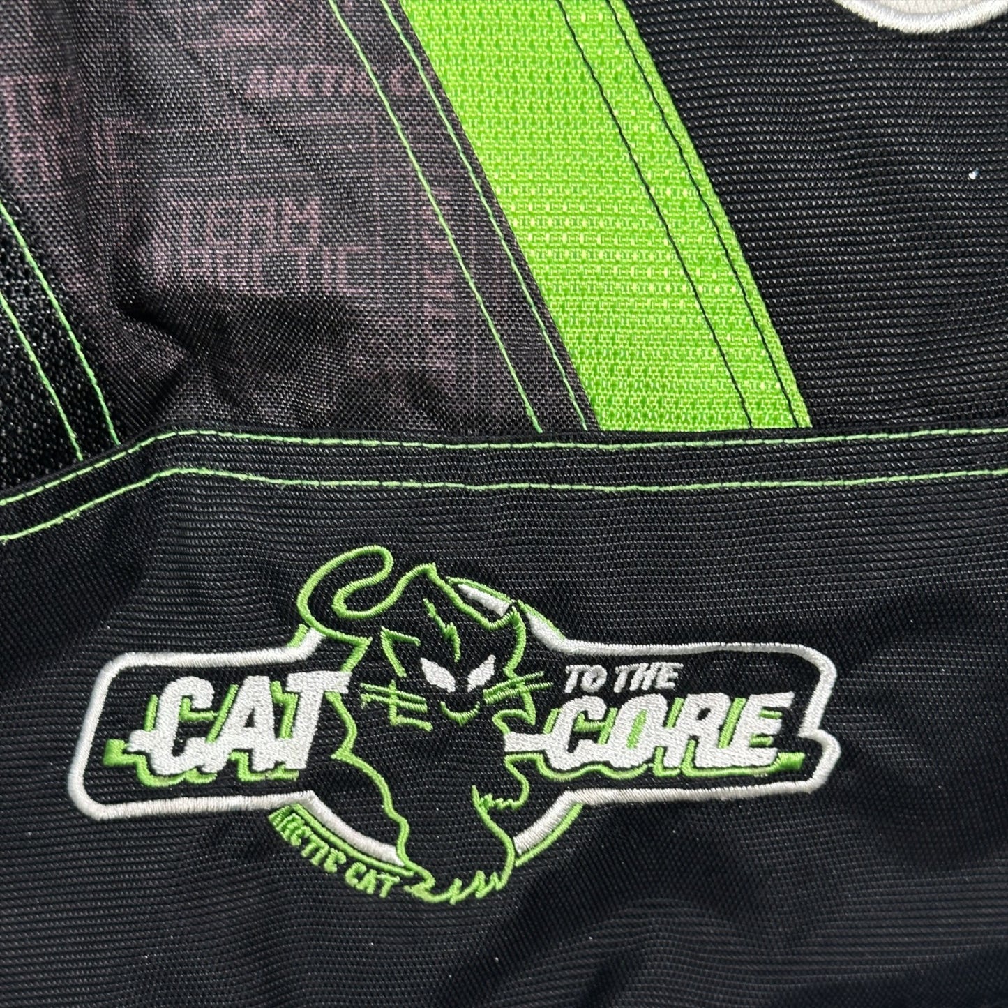 Digg It Thrift & Vintage Arctic Cat Team Arctic snowmobile racing jacket with Cat To The Core embroidery in green