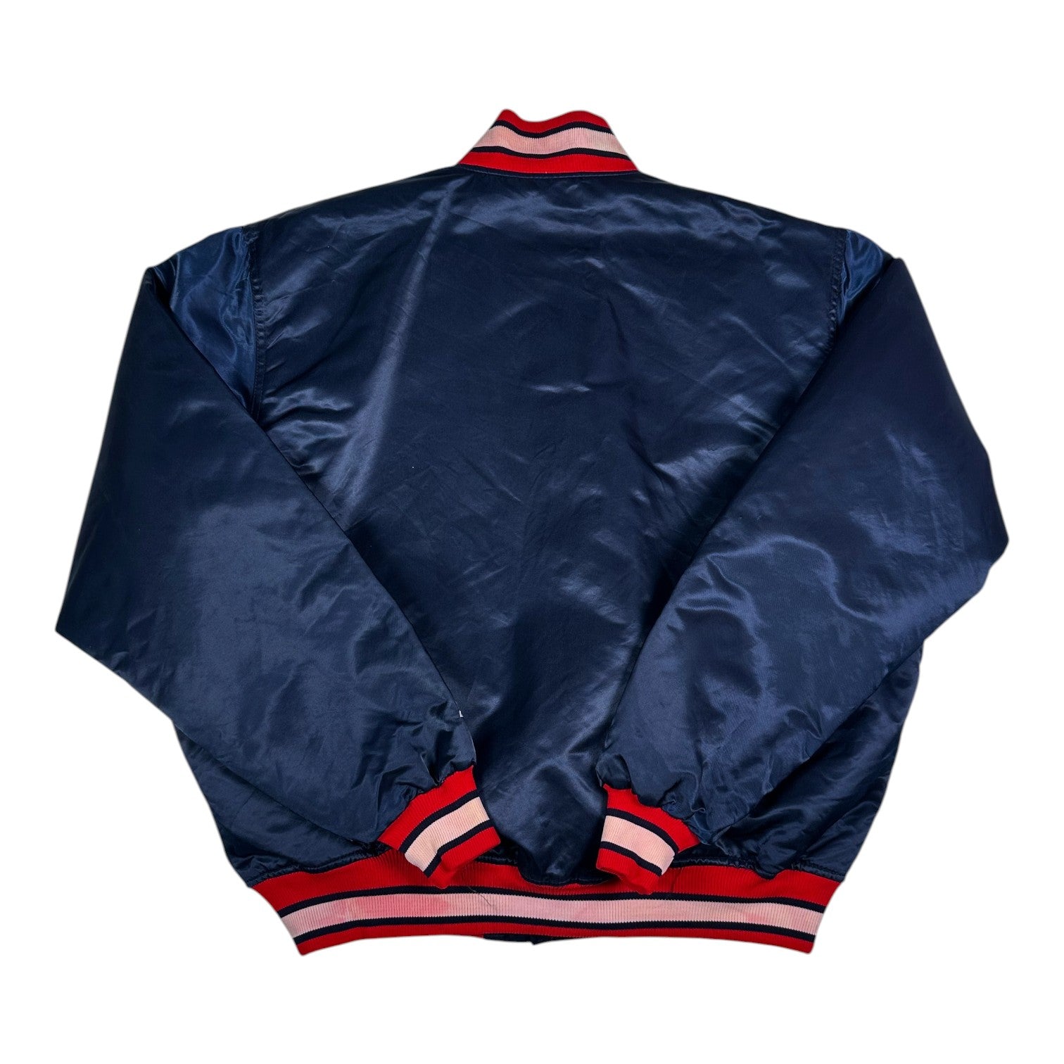 Back view of a vintage Digg It Thrift & Vintage Starter Atlanta Braves navy blue satin bomber jacket with striped trim