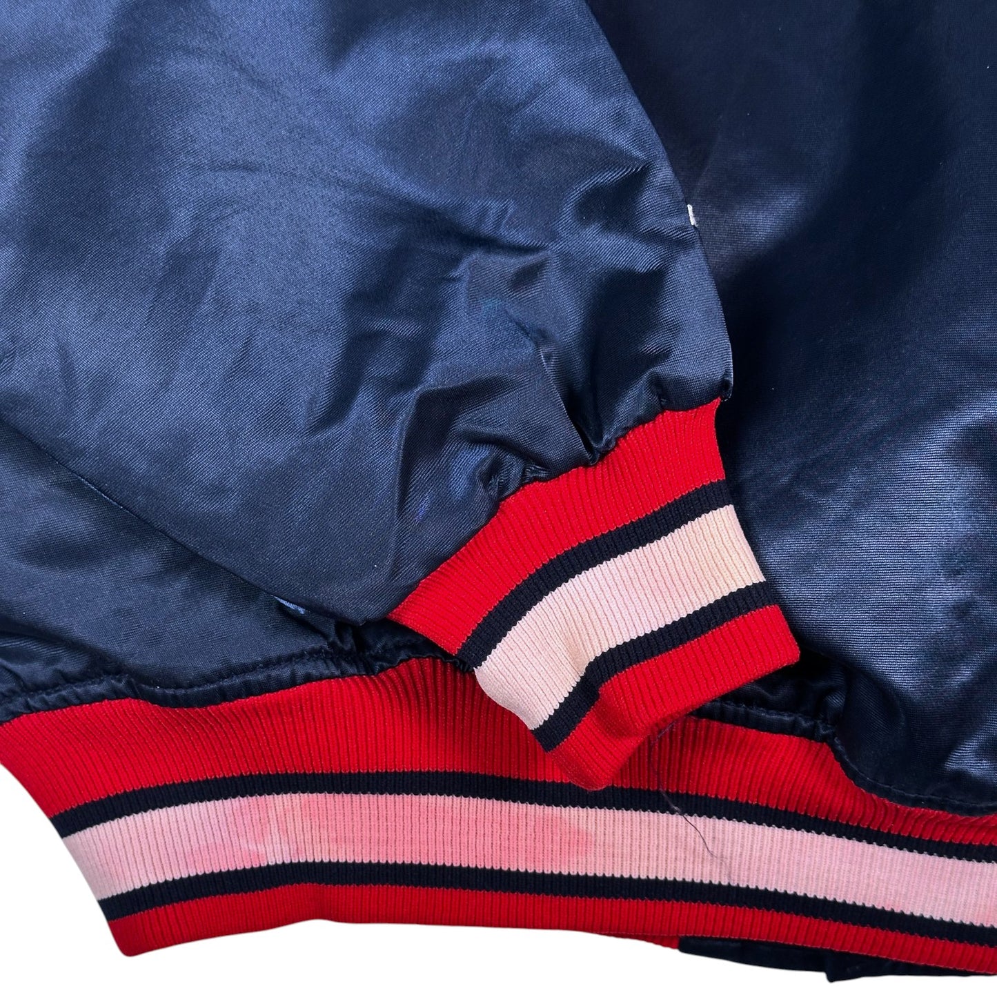 Digg It Thrift & Vintage Starter Atlanta Braves navy blue satin bomber jacket sleeve cuff with red and white stripes