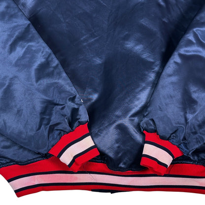 Digg It Thrift & Vintage navy blue satin Atlanta Braves bomber jacket with red and white striped ribbed cuffs