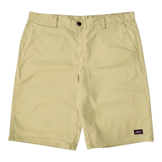 Digg It Thrift & Vintage beige Dickies work shorts with a button closure and small logo patch on the leg.