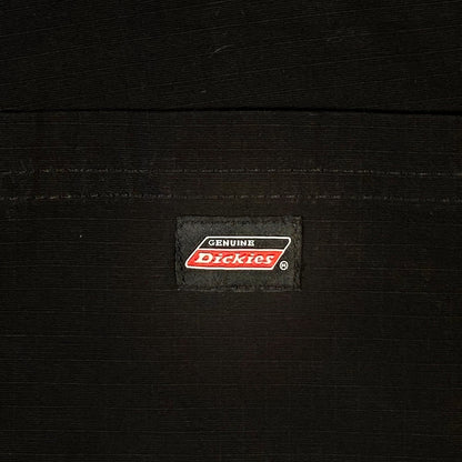 Digg It Thrift & Vintage black Dickies work shorts featuring a classic woven brand logo patch on the back pocket