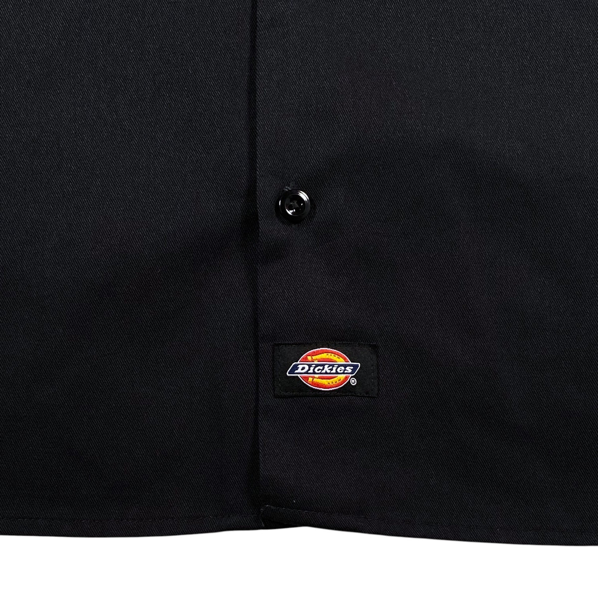 Digg It Thrift & Vintage black Dickies work shirt with button-down front and iconic logo patch