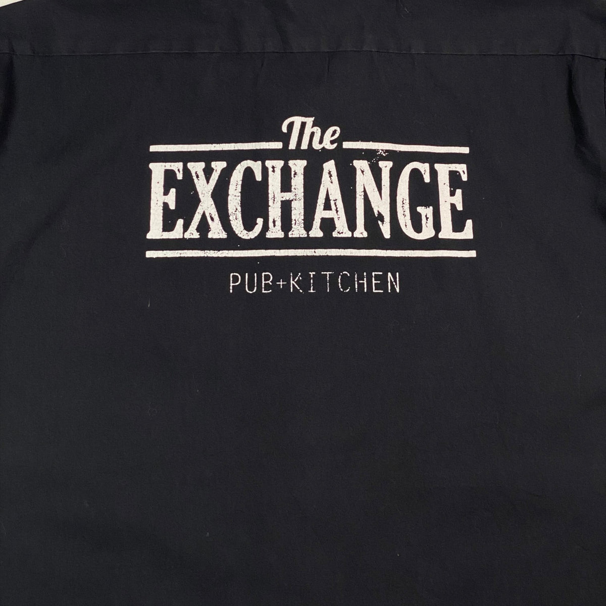 Digg It Thrift & Vintage black Dickies work shirt featuring The Exchange Pub + Kitchen white back graphic print