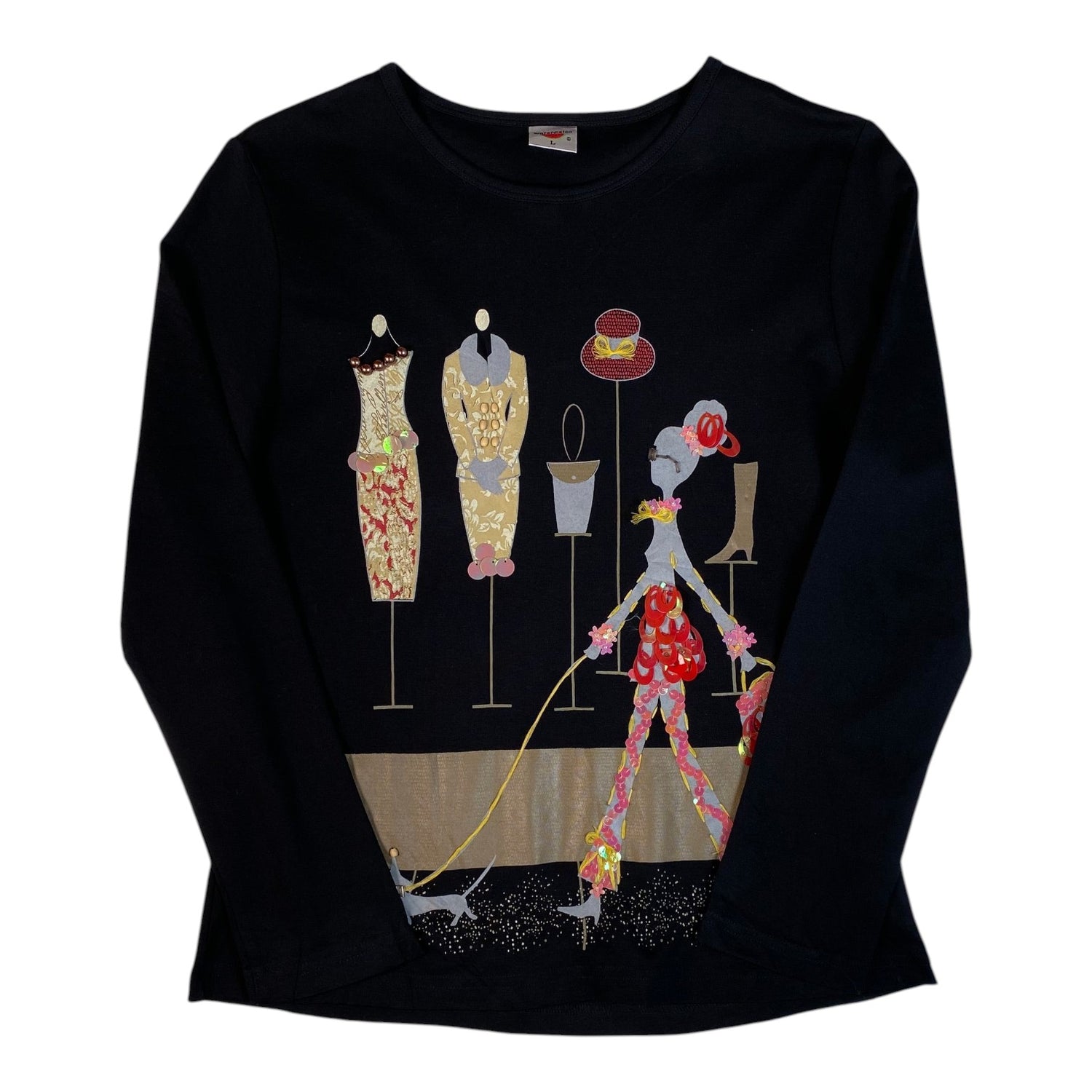 Digg It Thrift & Vintage black long sleeve top featuring a whimsical fashion runway graphic with embellished details.