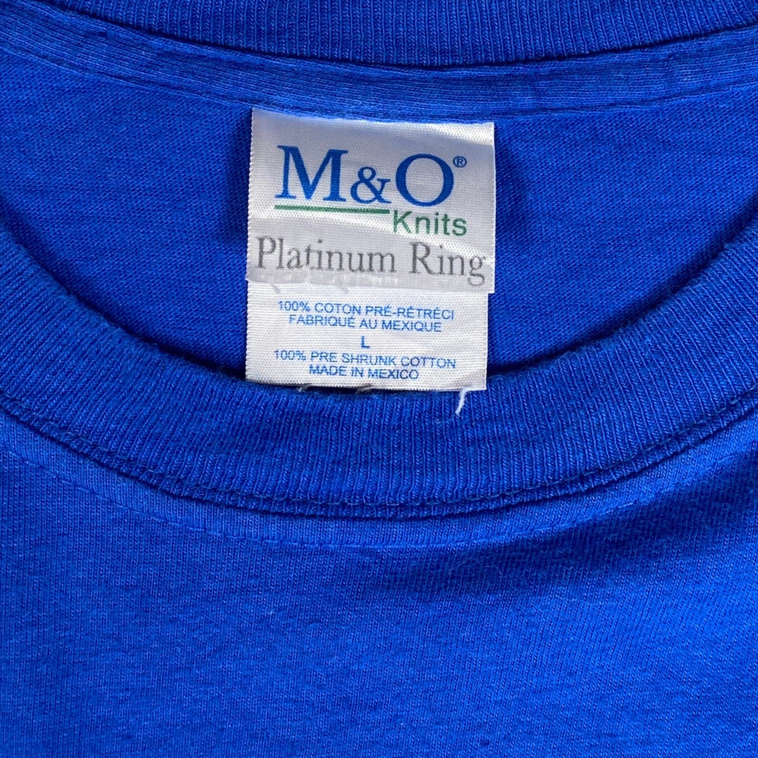 Digg It Thrift & Vintage blue M&O Knits cotton t-shirt tag showing size large and made in Mexico