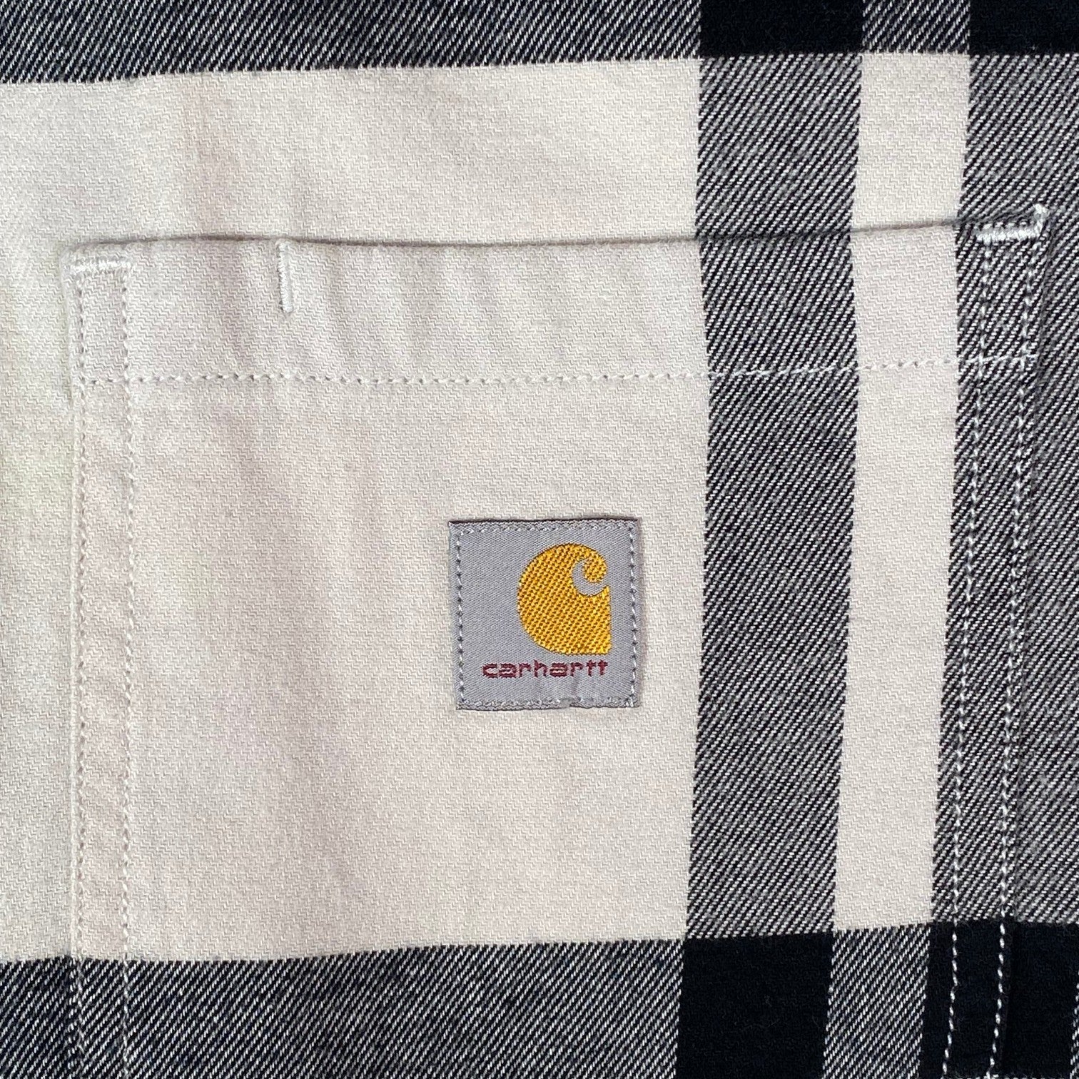 Digg It Thrift & Vintage Carhartt Rugged Flex white and black plaid flannel shirt chest pocket with logo patch