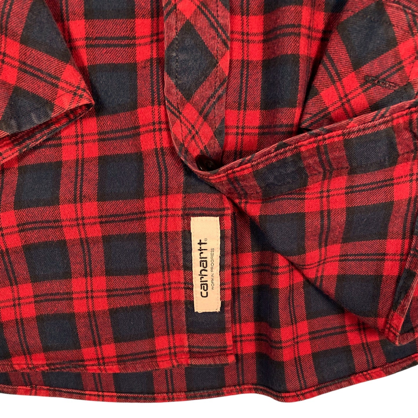 Digg It Thrift & Vintage Carhartt WIP red and navy plaid flannel long sleeve shirt with front brand label