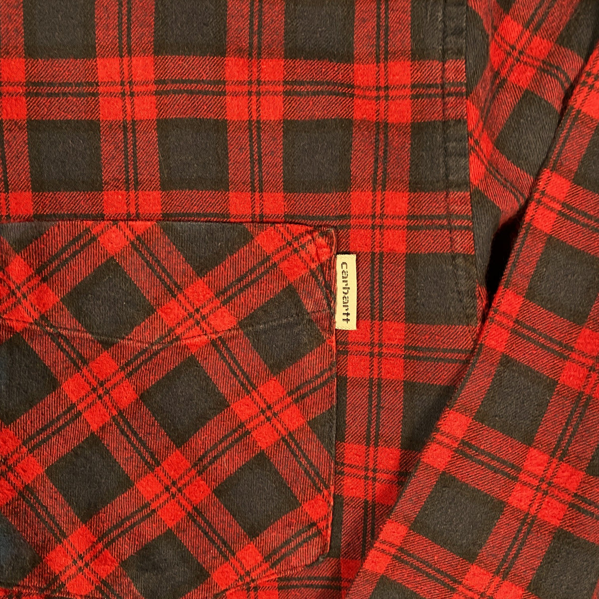 Digg It Thrift & Vintage Carhartt WIP red and navy plaid flannel shirt with chest pocket and branded tab